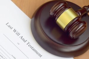 A document that says last will and testament with gavel as the featured image for the article by Kelley A Way titled What is probate