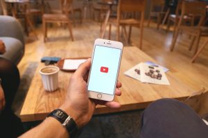 person watching you tube on phone fair use frequently asked questions article by kalley way lawyer walnut creek