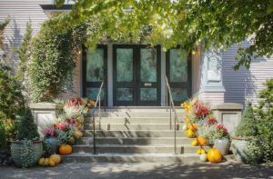 house with steps and pumpkins potted plants for article on step-up in basis inherting property from your parents california kelley way attorney walnut creek