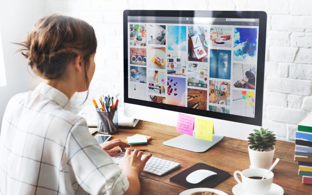 A woman looking at a computer screen full of stock images is the featured image for the blog post by kelley way titled Can I use this picture? Using Third-Party Images in Books and Media